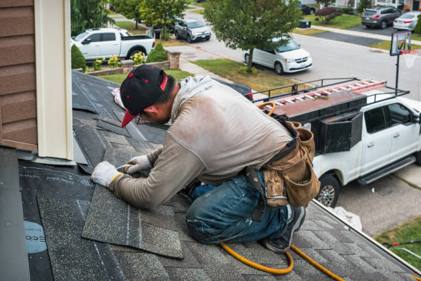 Professional Roofing technician working in Minersville, PA